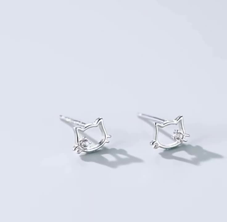 S999 sterling silver hollow cat ear nail earrings