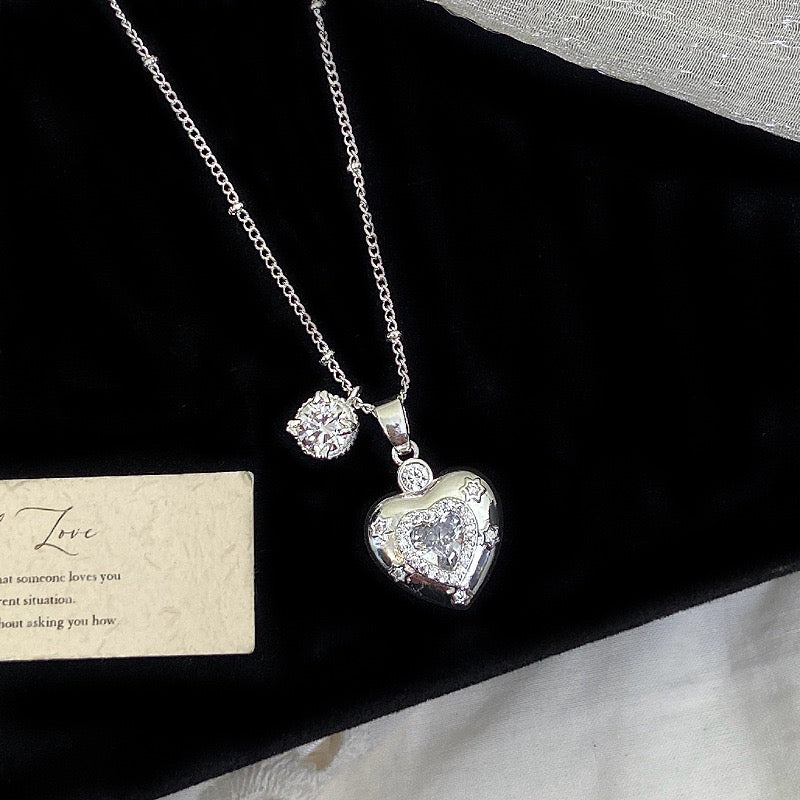 Star-themed earrings with zircon accents and a matching necklace set.